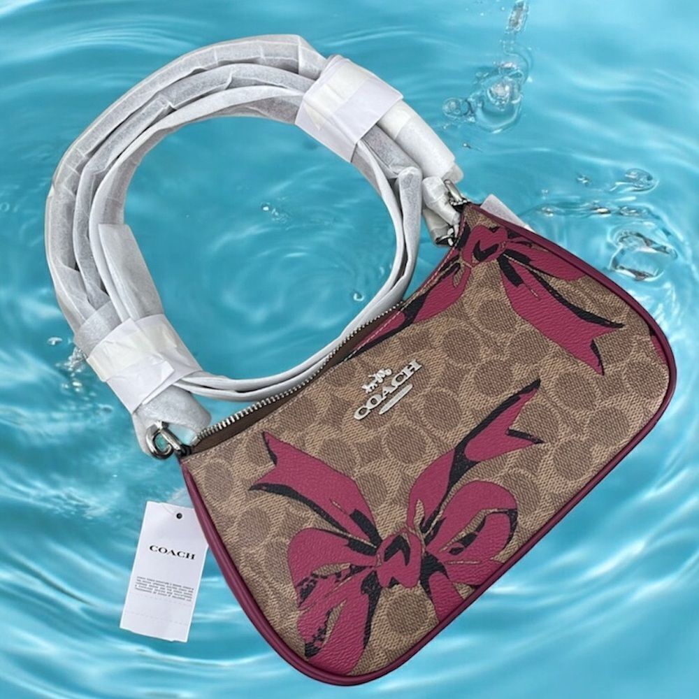 Coach Teri Shoulder Bag Crossbody In Signature Canvas With Bow Print Purse